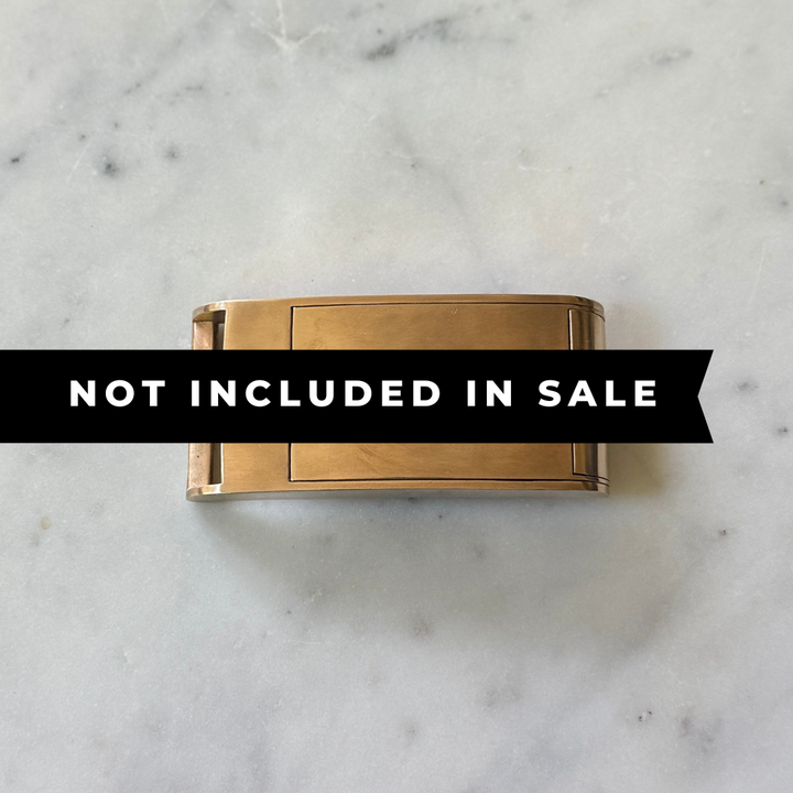 THE BELT BUCKLE