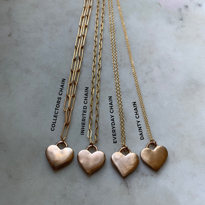 Heart Charm on different types of chains arranged from largest to smallest