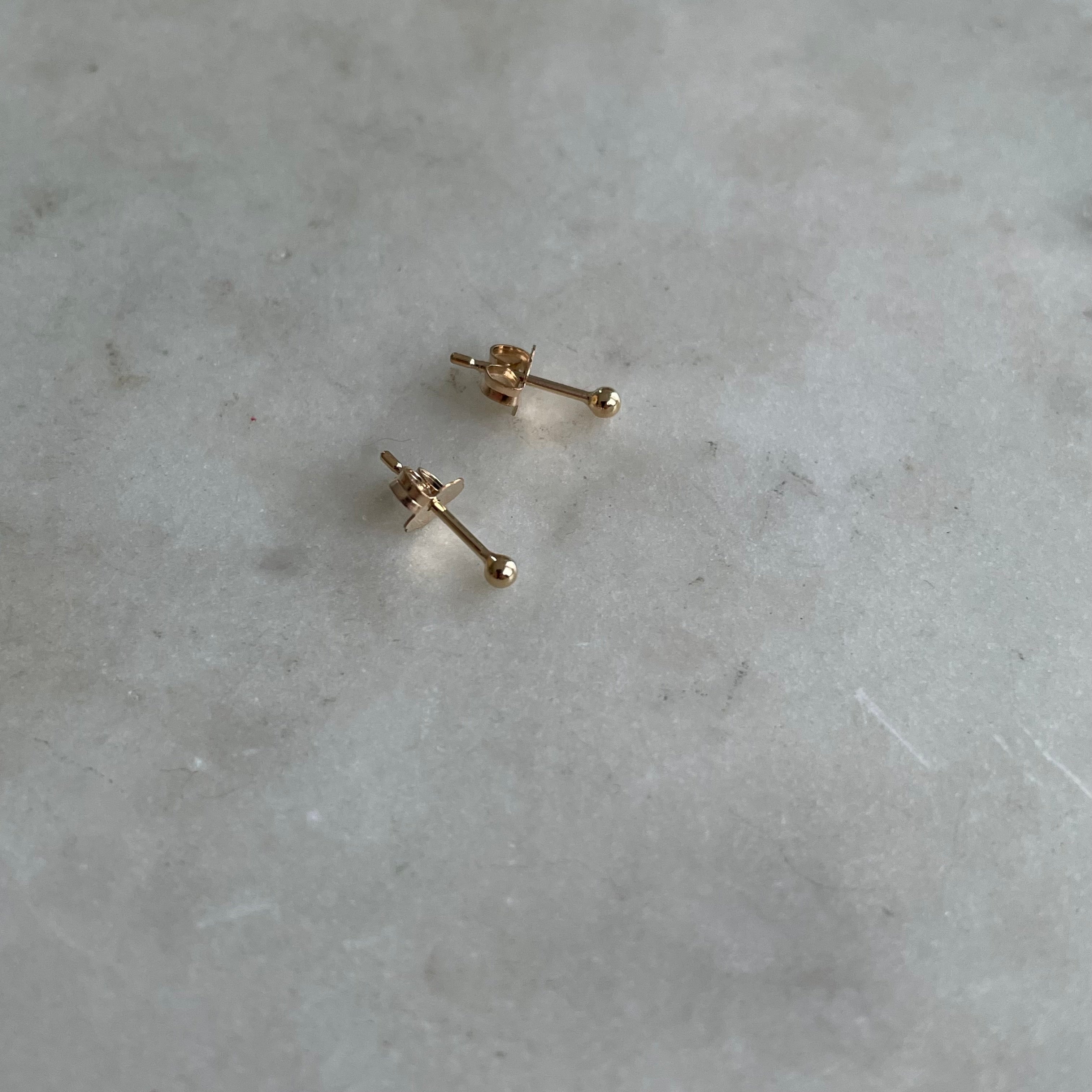 Tiny ear deals studs gold