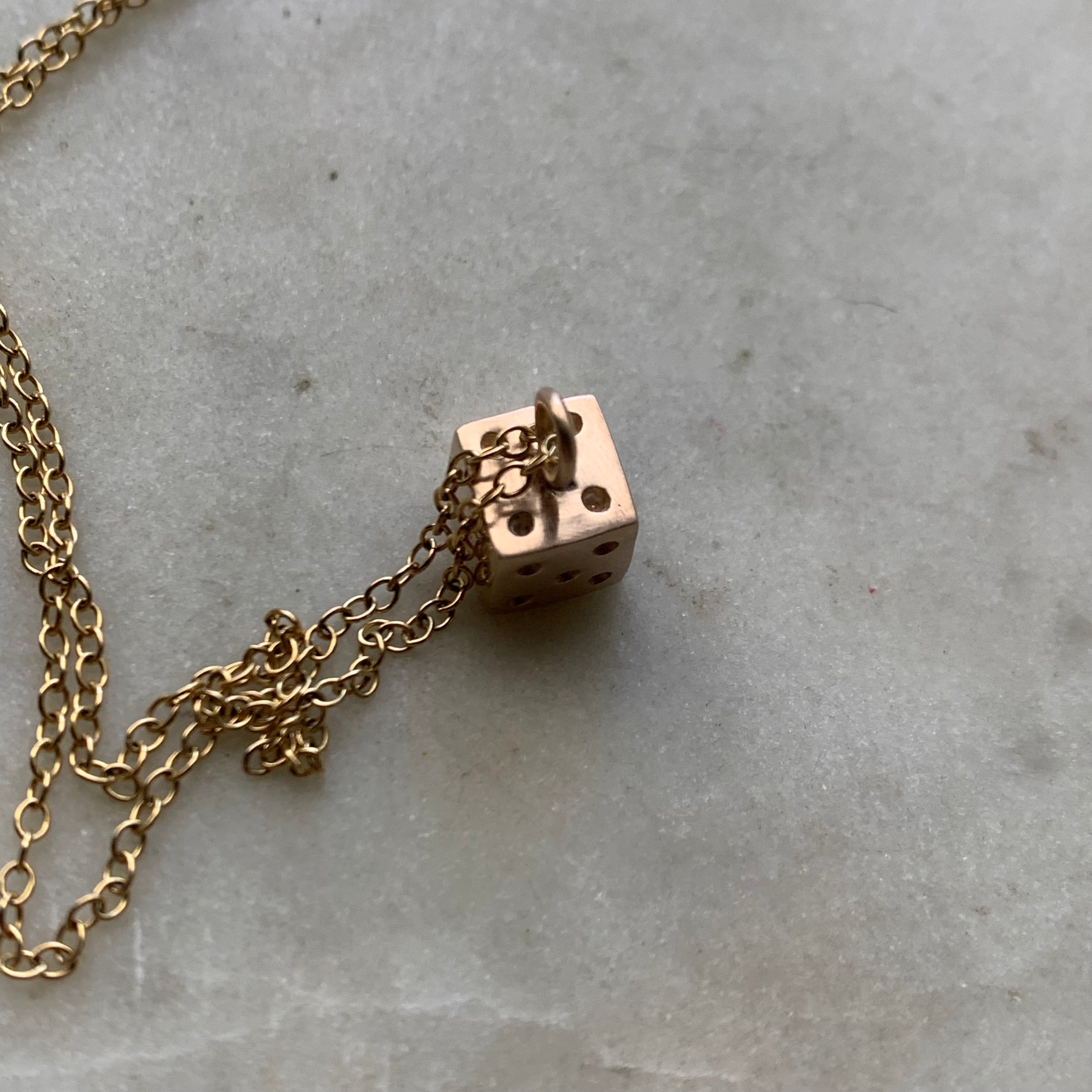 Gold on sale dice pendant