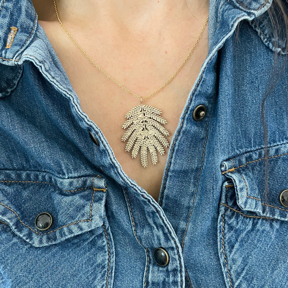 Woman Wearing Handmade Bronze Large Mimosa Leaf Pendant Necklace