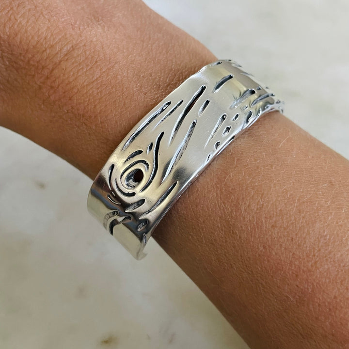 Woman Wearing Handmade Silver Pecky Cypress Cuff Bracelet