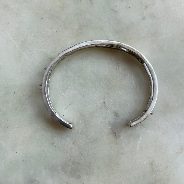 Side View of Handmade Sterling Silver Daydreamer Cuff Bracelet with moving parts