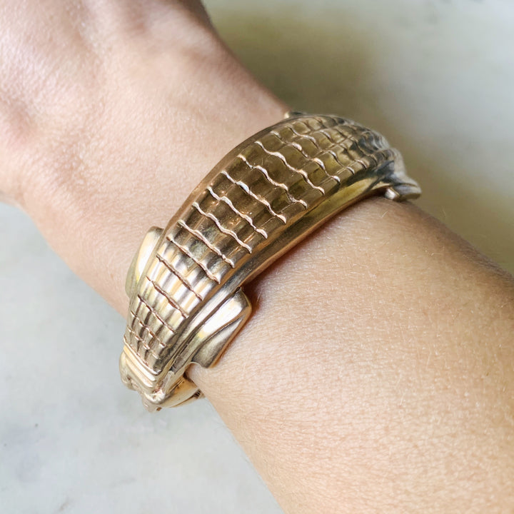 Woman Wearing Handmade Bronze Alligator Cuff Bracelet with Turquoise Eyes